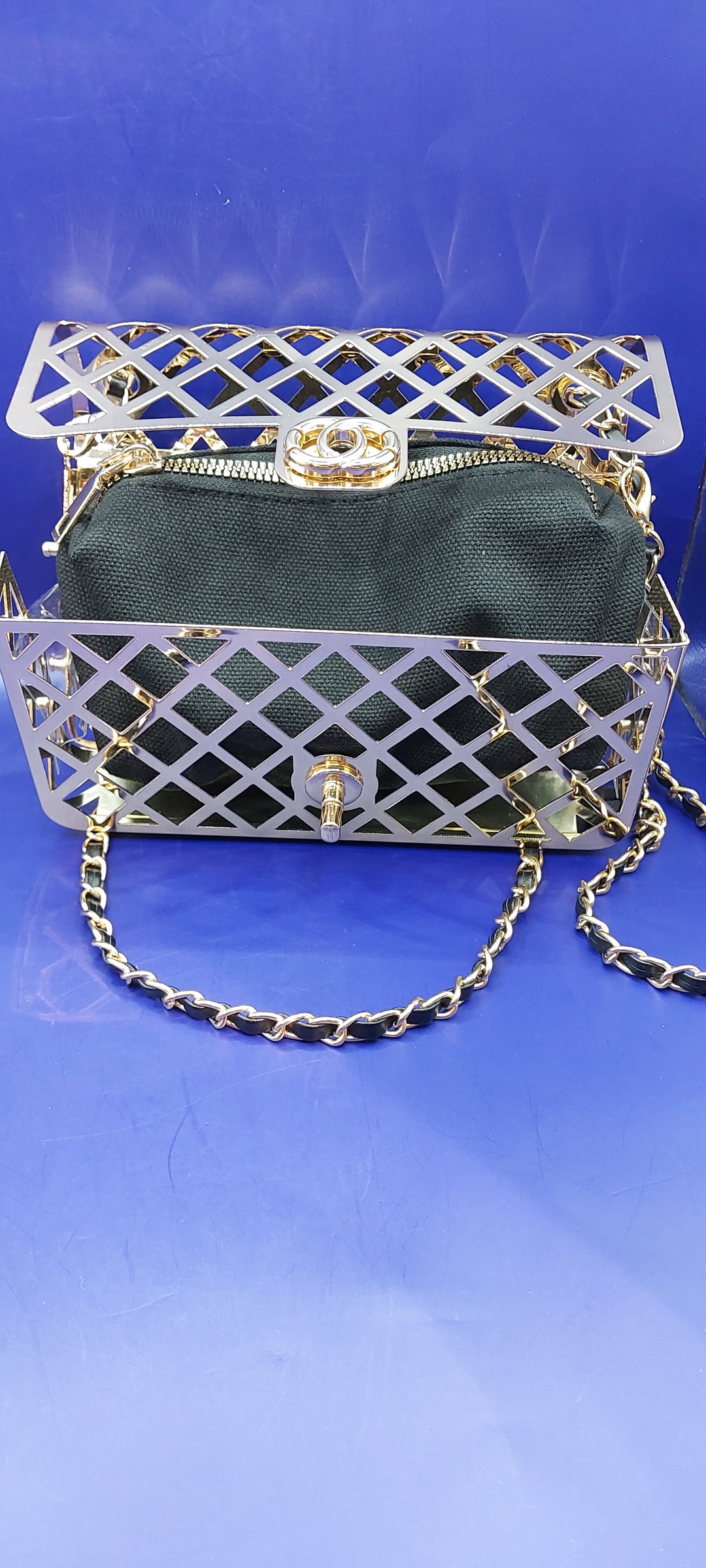 Black and Gold Cage Handbag with a Gold Braided Chain Strap