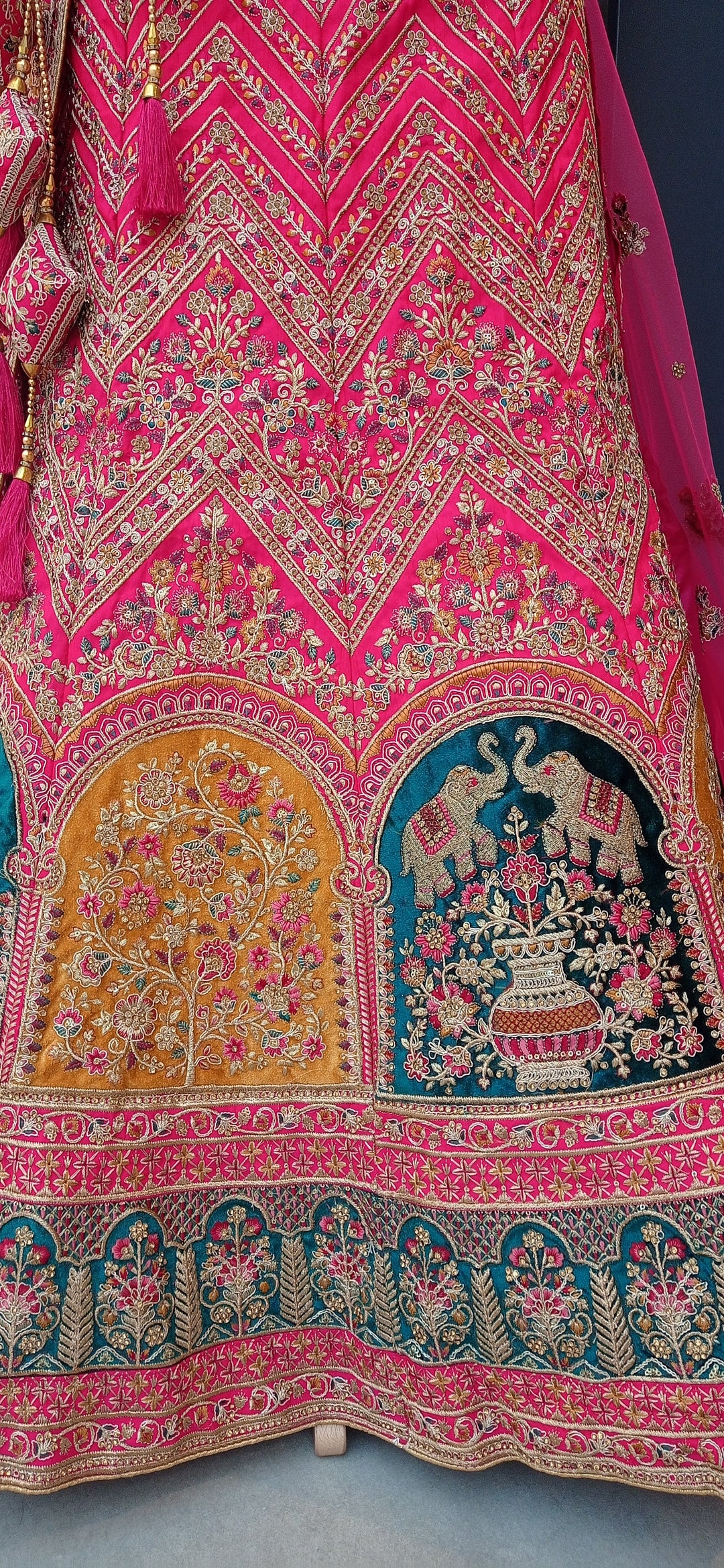 Shagun Bridal Rani Pink and Gold Mughal Lehenga in dubai (Unstitched)